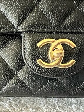 CHANEL Black Quilted Caviar Maxi Flap Bag with Gold CC Turnlock